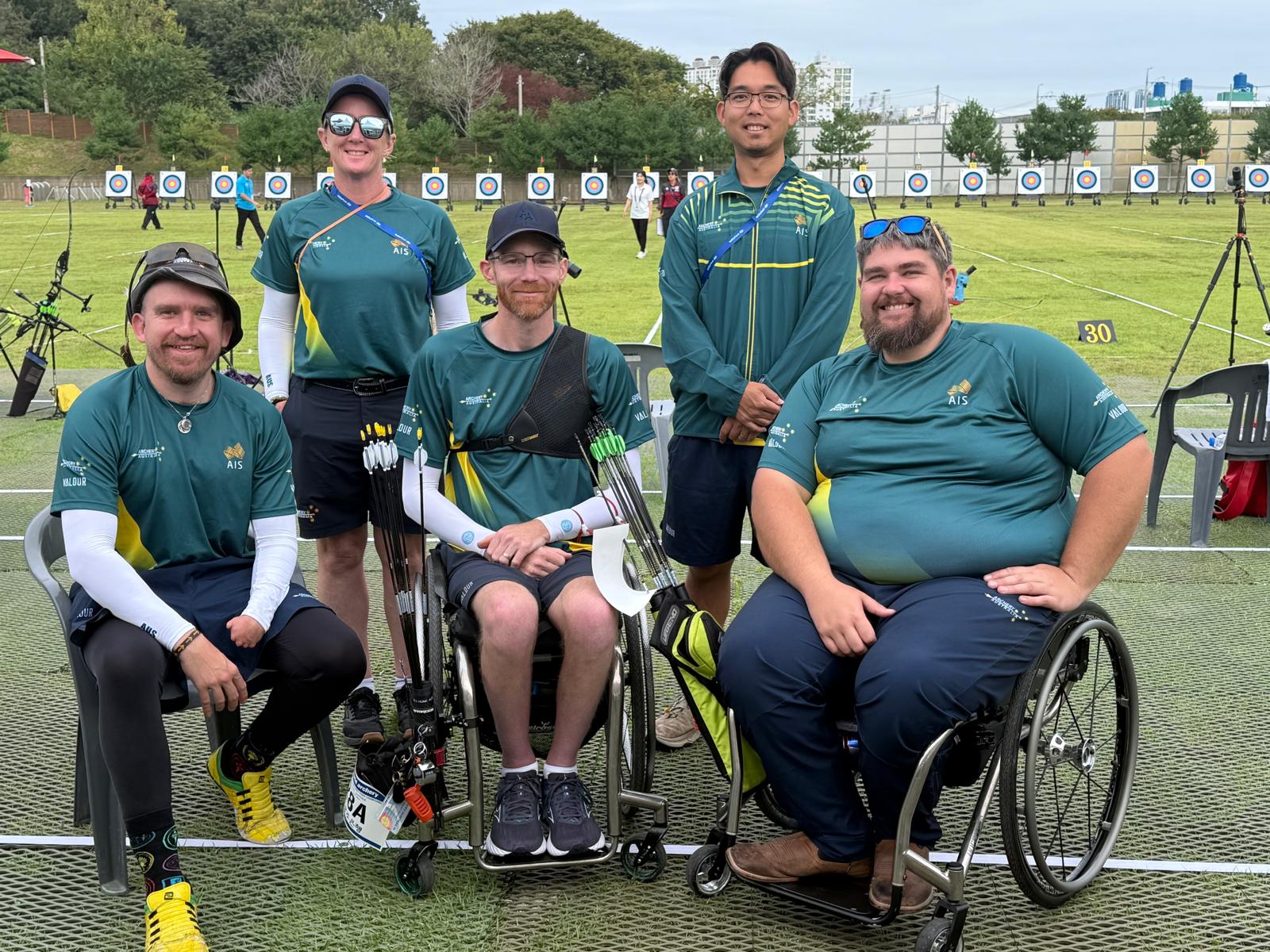 Thomas Holland, front right, with his Australian archery teammates at the range