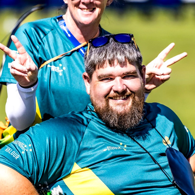 Thomas smiling with an Australian teammate at the World Championships